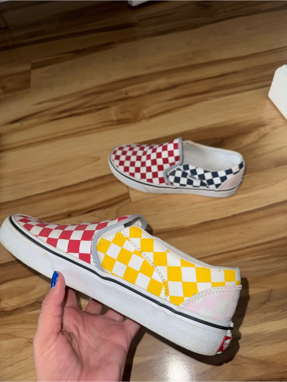 Vans Checkerboard Slip-On Sneakers in Red, Yellow, Blue, Pink